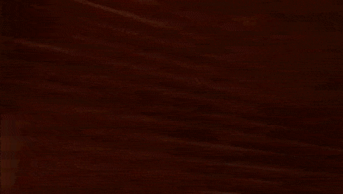 a gray and pink striped background with a few lines on it