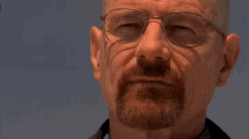 a man with glasses and a beard has the words you 're goddamn right above his face
