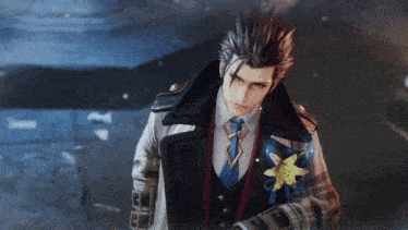 a man in a suit and tie with a flower on his jacket