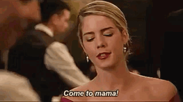 a woman in a red dress is talking to a man in a bar and says `` come to mama '' .