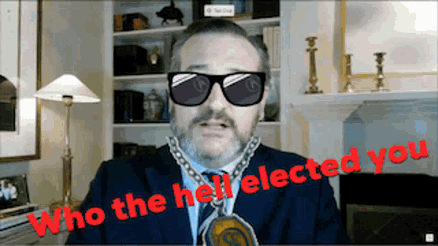 a man wearing sunglasses has the words who the hell elected you written below him