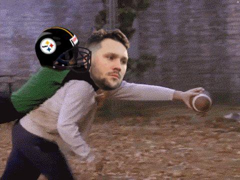 a man in a pittsburgh steelers helmet throws a football