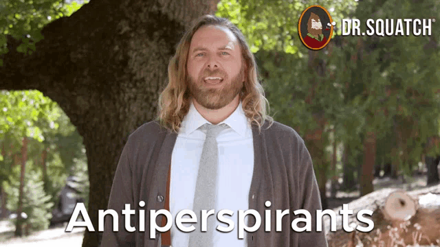 a man in a suit and tie stands in front of a tree with the words " antiperspirants " on the bottom right
