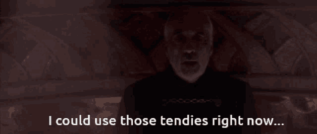 a man says " i could use those tendies right now " in a dark room