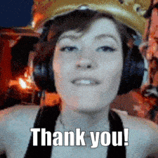 a girl wearing headphones and a crown says thank you
