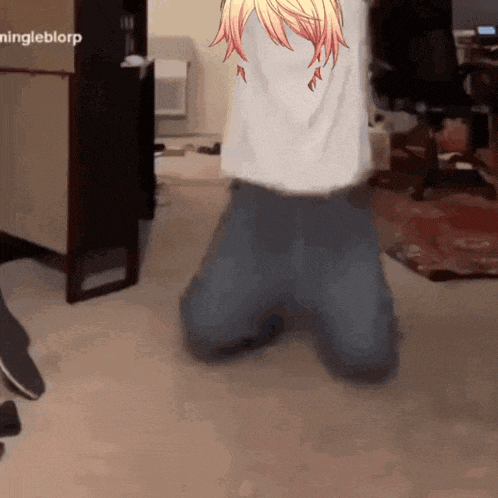 a person is kneeling down with a picture of a girl on the back of their shirt that says ningleblorp