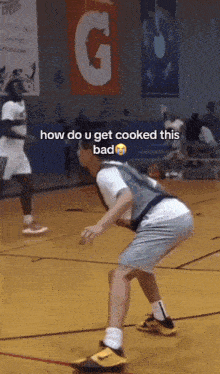 a man playing basketball on a court with the words how do u get cooked this bad below him