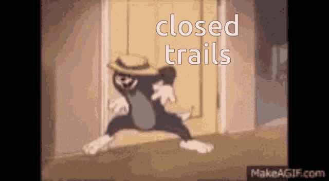 a cartoon of tom and jerry with the words closed trails on the bottom