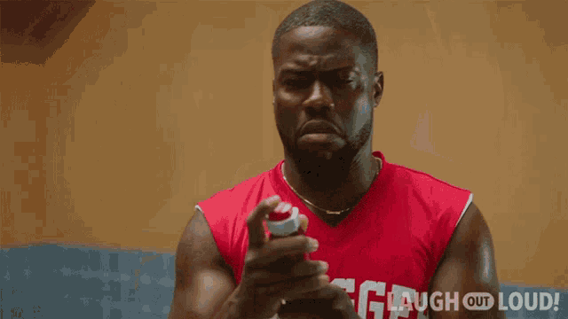 a man wearing a red swagger jersey with the number 1