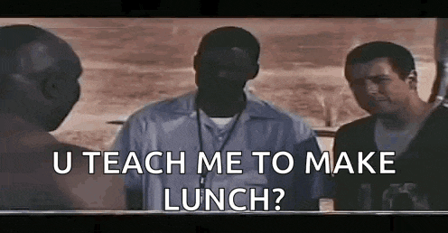 a group of men are standing next to each other and one of them is asking another man to teach him how to make lunch .