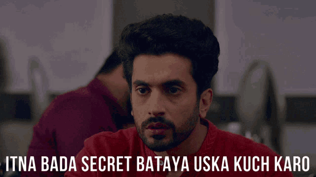 a man in a red shirt with the words itna bada secret bataya uska kuch karo