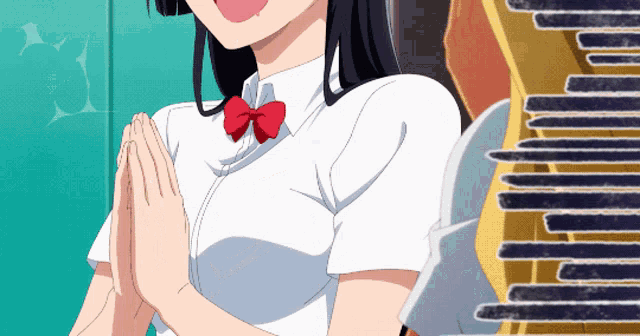 a girl in a white shirt with a red bow tie