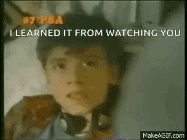 a young boy is laying in a hospital bed with the words `` i learned it from watching you '' written above him .
