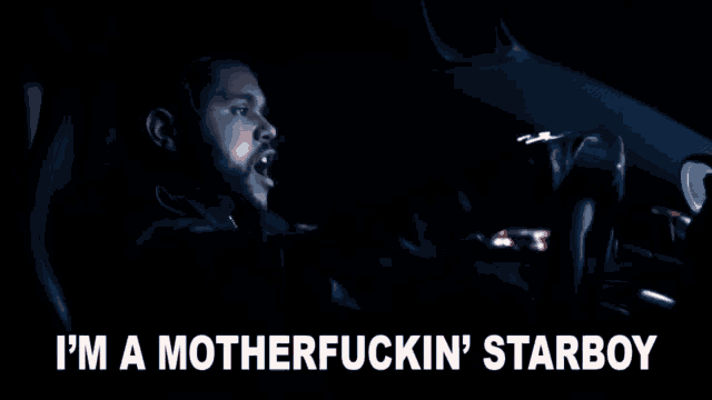 a man driving a car with the words i 'm a motherfuckin ' starboy