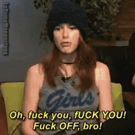 a woman wearing a beanie and a tank top says oh fuck you fuck you fuck off bro .