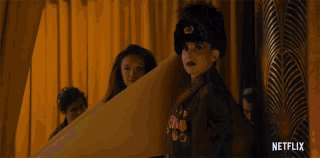 a netflix ad shows a woman in a russian hat