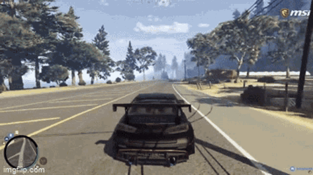 a car is driving down a road with a msi logo on the bottom right