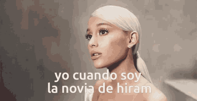 a woman with a ponytail and the words yo cuando soy la novia de hiram above her
