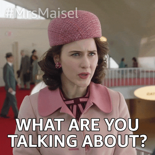 a woman wearing a pink coat and hat says what are you talking about