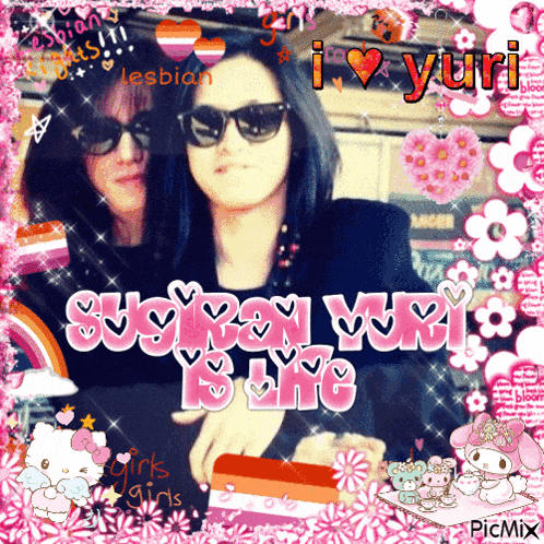 a picture of two women with the words i love yuri