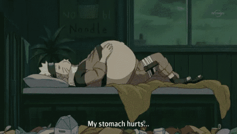 a cartoon of a man laying on a bed with his stomach hurting