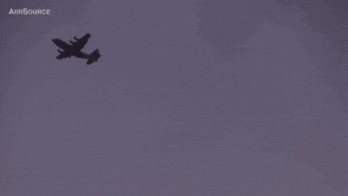 a plane is flying in a purple sky with airsource written on the bottom right