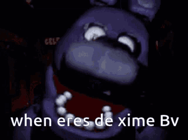bonnie the bunny from five nights at freddy 's is looking at the camera in the dark