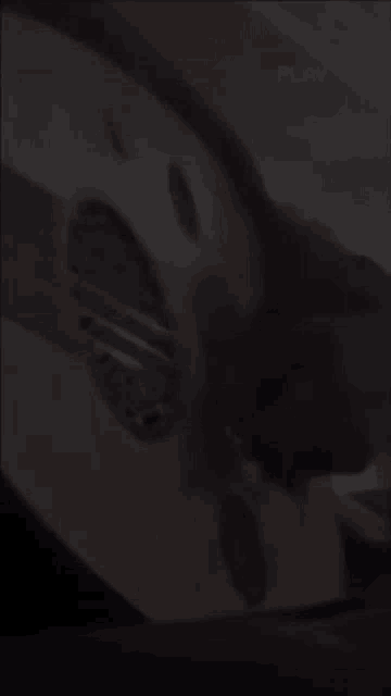 a blurred image of a car with the word play on the bottom