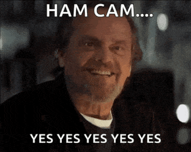 a man with a beard is smiling with the words yes yes yes yes yes