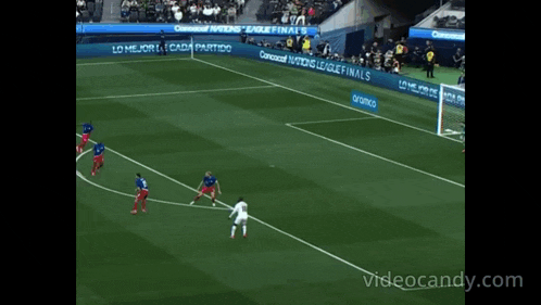 a soccer game is being played in a stadium sponsored by concacaf