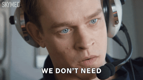 a man with headphones and a microphone says we don 't need