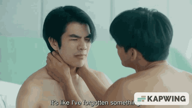 two shirtless men are touching each other 's faces and the caption says it 's like i 've forgotten something