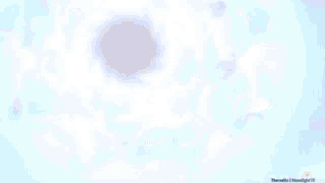 a blue sky with white clouds and a light coming out of it