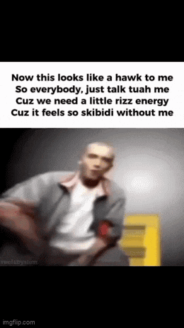 a blurry picture of a man sitting in front of a yellow box with the words `` now this looks like a hawk to me ''