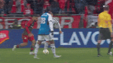 a soccer player with the number 18 on his shirt
