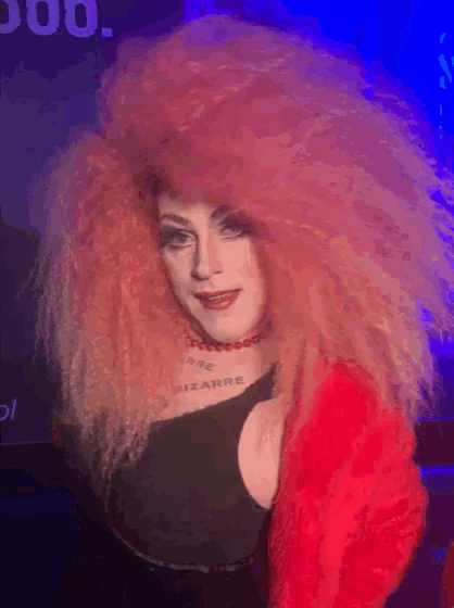 a woman with a choker that says bizarre