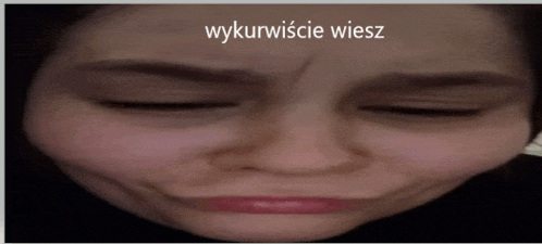 a close up of a woman 's face with the words wykurwisie wiesz written above it