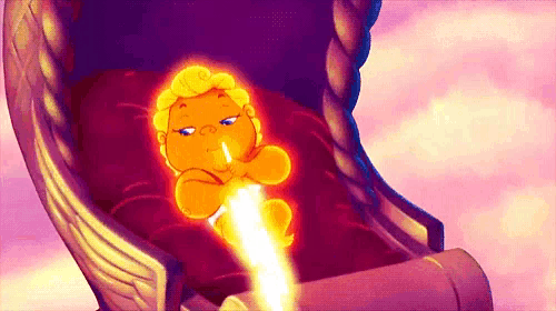 a cartoon character is sitting in a crib with a rocket coming out of it .