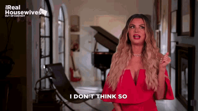 a woman in a red dress says " i don t think so "