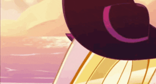 a cartoon character wearing a purple hat is sitting on a beach .