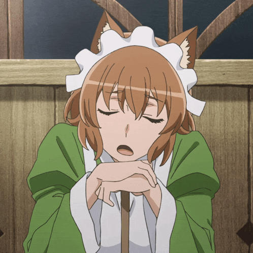a girl with a fox ear and a maid 's apron is sleeping with her eyes closed