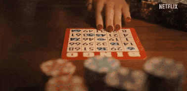 a person playing a game of bingo with a netflix logo in the corner