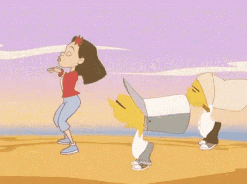 a couple of cartoon characters are dancing on a beach .