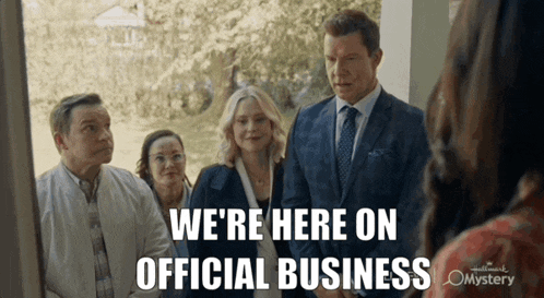 a group of people are standing in front of a window with the words we 're here on official business