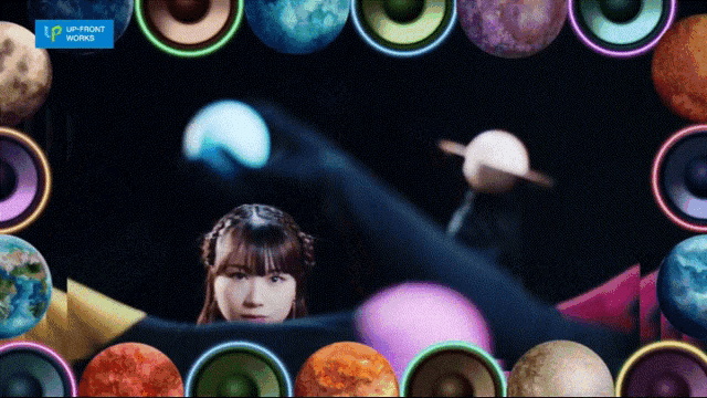 a girl is surrounded by planets and a sign that says " upfront works "
