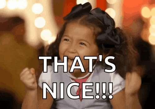 a little girl with a black bow on her head says that 's nice !