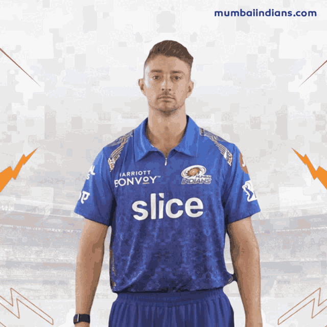 a man in a blue shirt that says slice