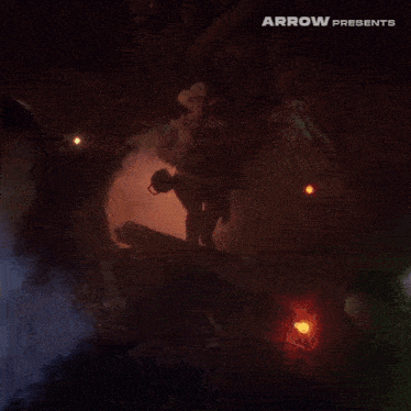 arrow presents a video of a car driving through a foggy forest