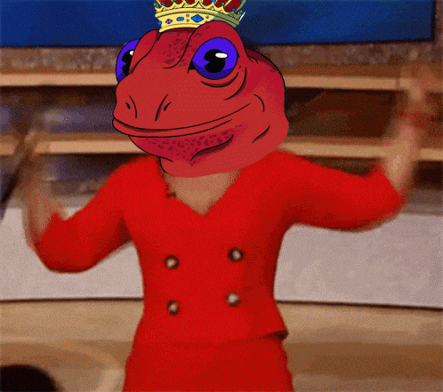 a red lizard with a crown on its head is wearing a red jacket