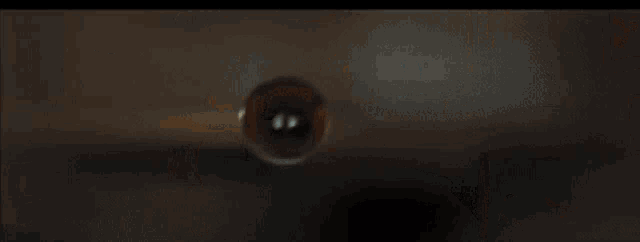 a blurred image of a space ship flying in the sky .